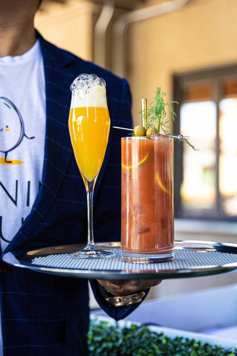 Mimosa and Bloody Mary on a tray at Morning Would Brunch