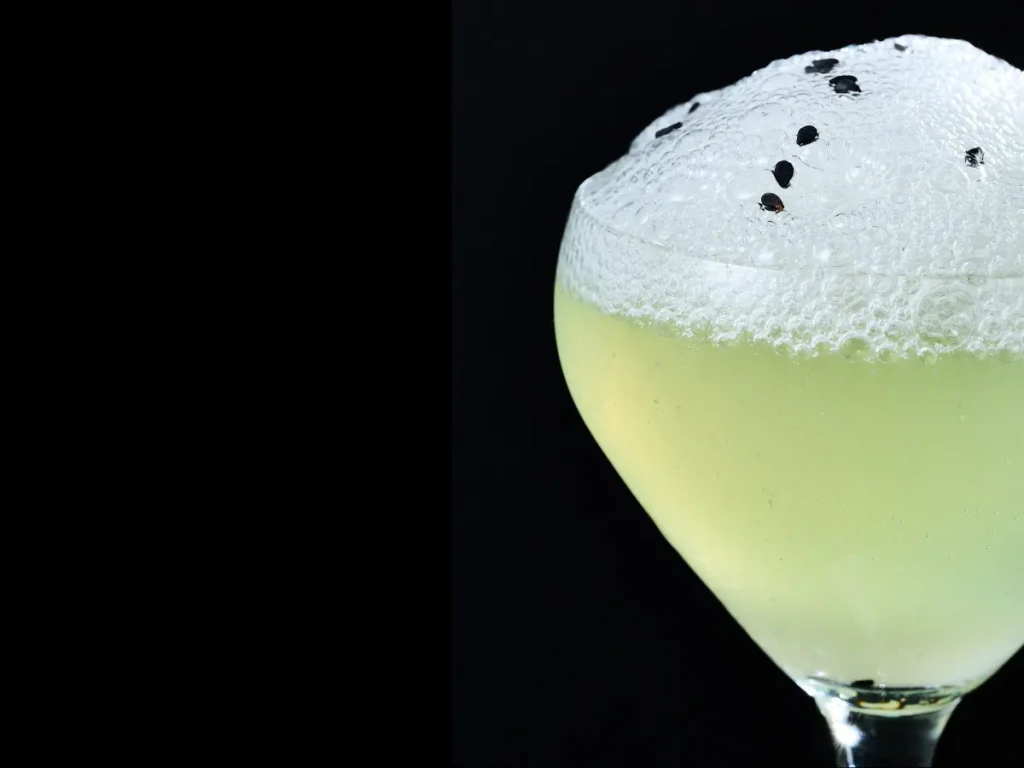 yellow Drink with foam on top