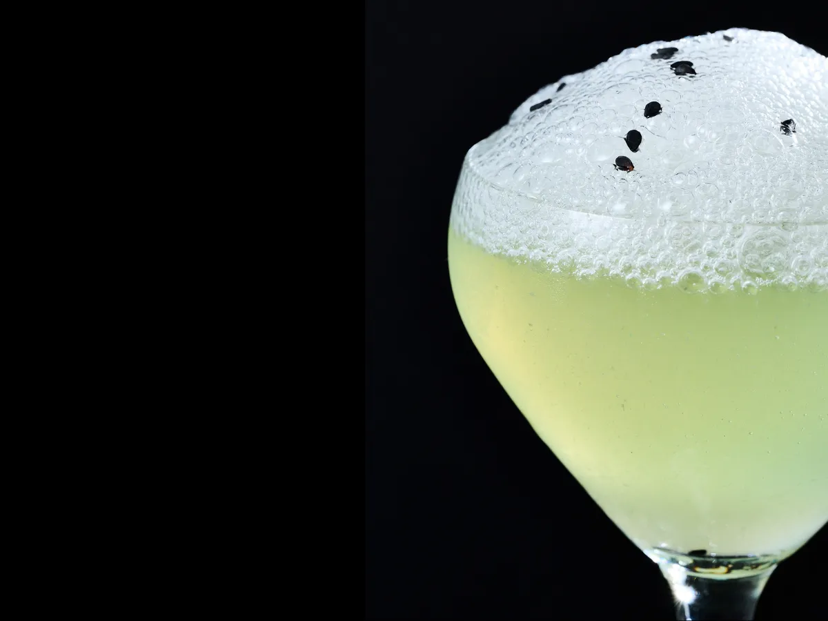 yellow Drink with foam on top